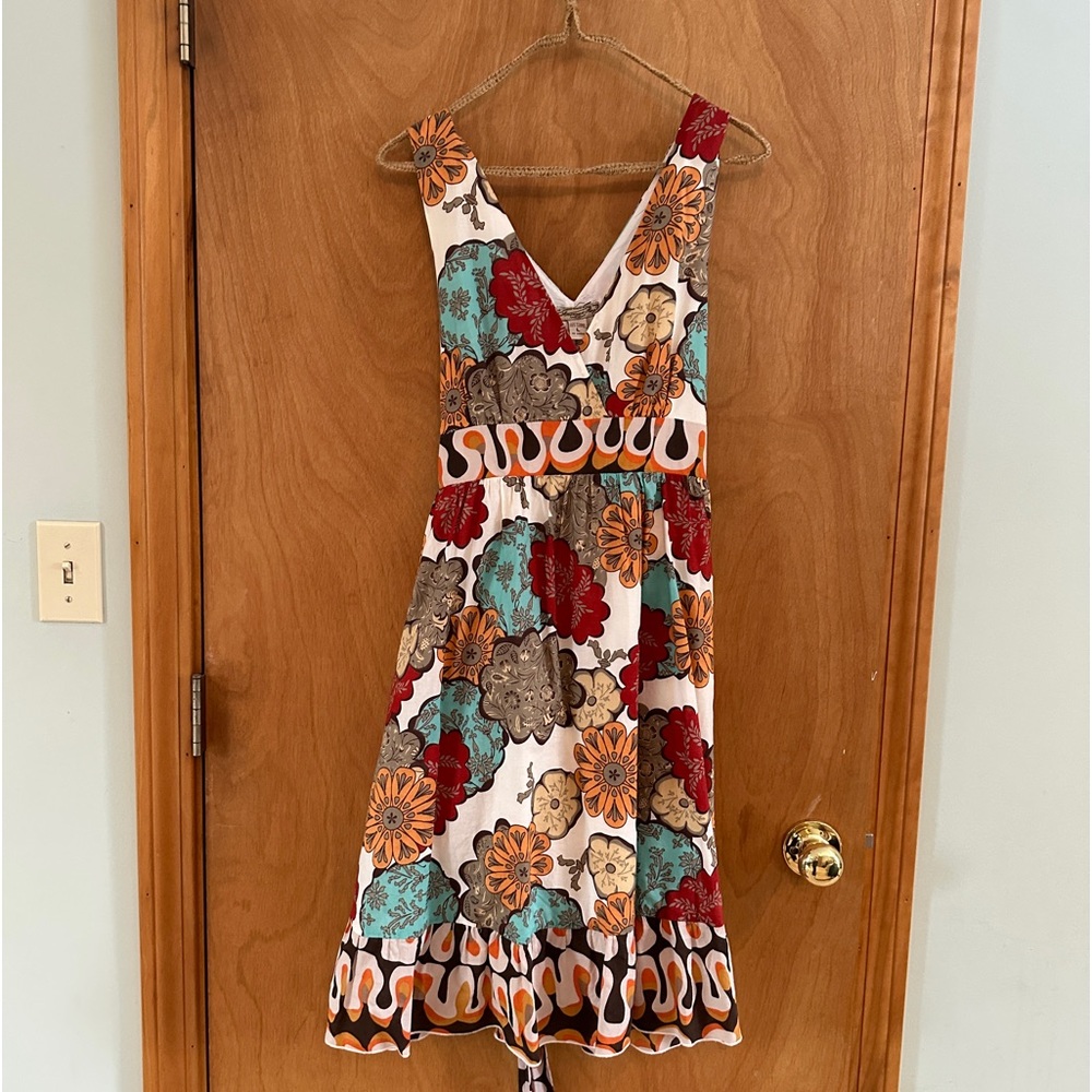 American Rag dress size L. Multi color, sleeveless, side zip with tie.